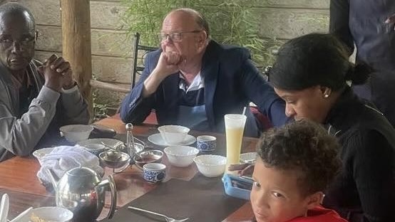 A group of people sitting at a table