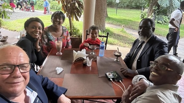 A group of people sitting at a table