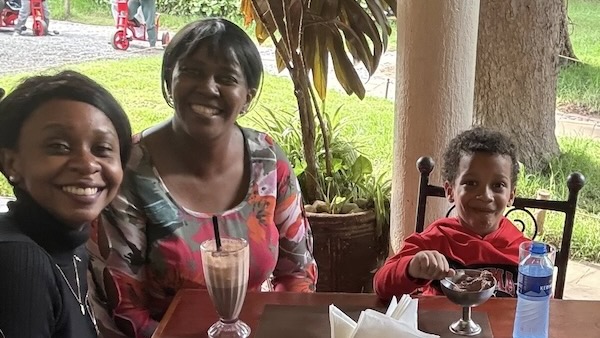 A person and a child sitting at a table