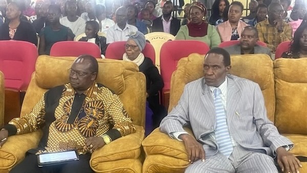 A group of people sitting in chairs