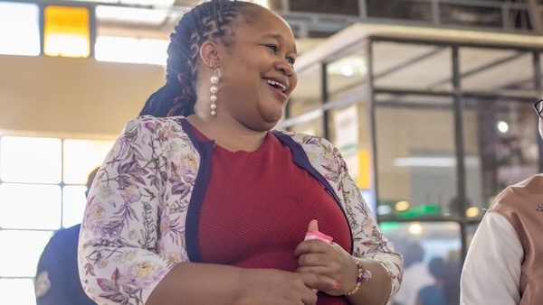 A person laughing in a room