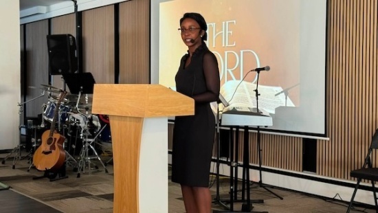 Dr. Adalia Hansen preaching
