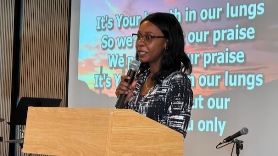 Dr. Adalia taking part in the ordination service