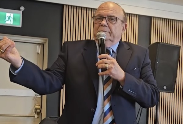 Dr. Hansen prophesying over the Jessos and the new church plant