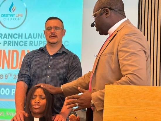 Praying over the Jessos and anointing with oil