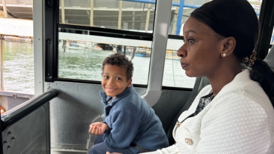 Dr. Adalia and MJ riding in the bus on the ferry back home
